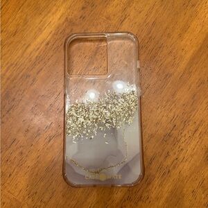 iPhone 13 Pro phone case. Brand is Case-Mate. Color: Clear with gold detail